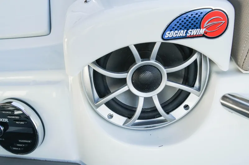 Slide: The Image of Close-up of a 2026 Crownline 288 SS boat speaker with "Social Swim" branding. - 15