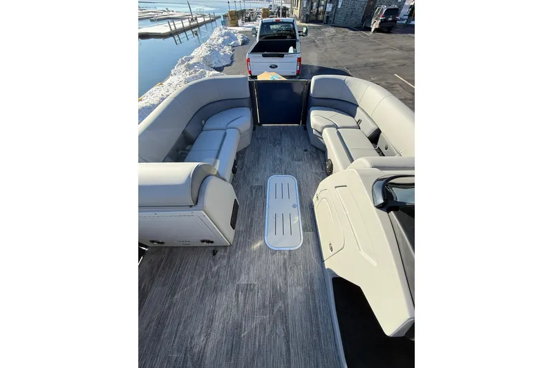 Slide: The Image of 2026 Bentley Pontoons Legacy 243 Navigator interior with luxurious seating and modern design. - 8