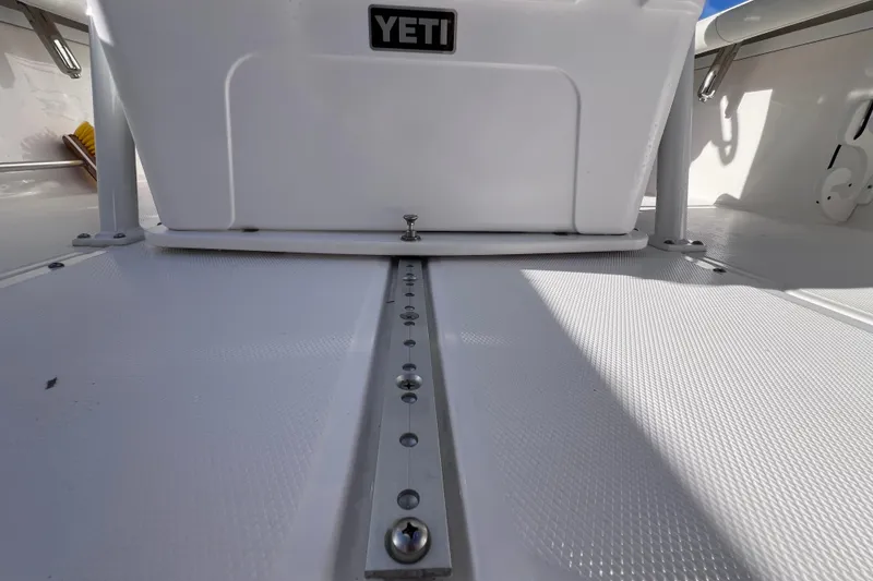 Slide: The Image of 2024 Everglades 243 Center Console boat deck with Yeti cooler. - 37