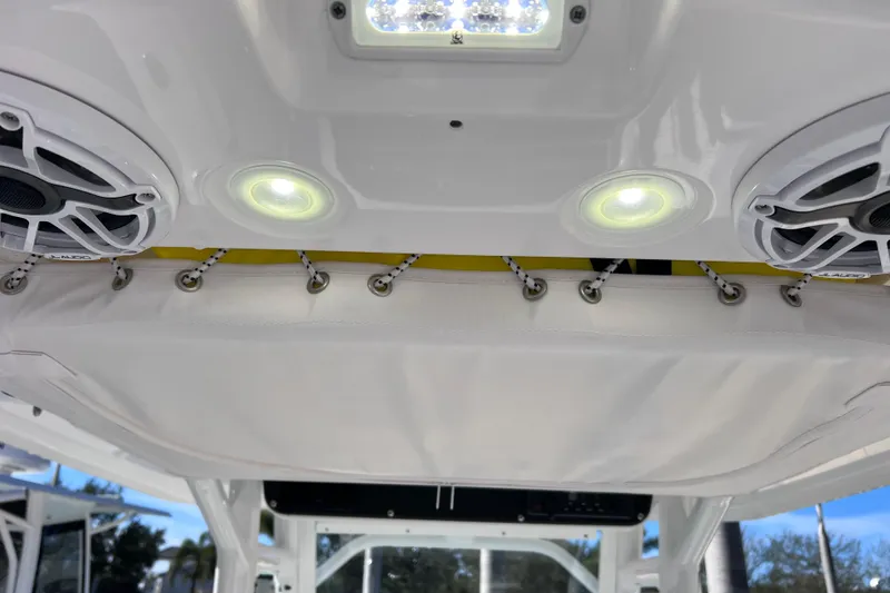 Slide: The Image of 2024 Everglades 243 Center Console boat interior with speakers and LED lights. - 45