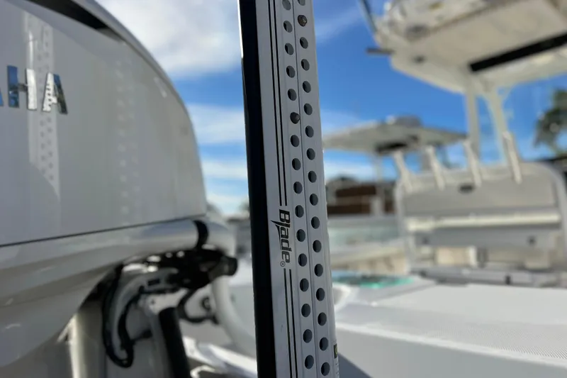 Slide: The Image of 2024 Everglades 243 Center Console boat with Yamaha engine, featuring Blade power pole. - 5