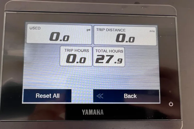 Slide: The Image of Display screen of a 2024 Everglades 243 Center Console showing trip data and total hours. - 60