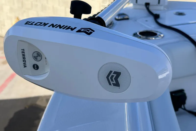 Slide: The Image of Minn Kota Terrova motor on 2024 Everglades 243 Center Console boat. - 71