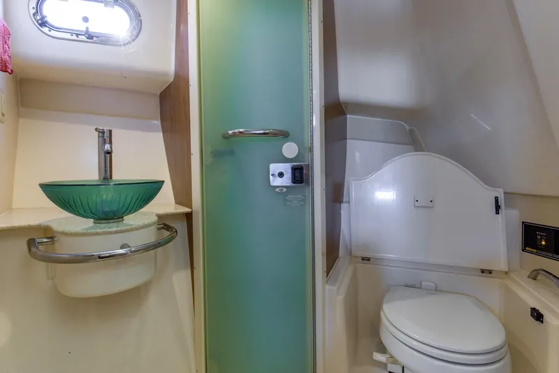 Slide: The Image of 2012 Pursuit 345 Offshore Head/Shower Compartment with Vessel Sink - 27