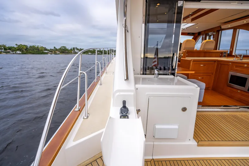 Slide: The Image of 2014 Grand Banks 50 Eastbay SX yacht with teak deck and luxurious interior. - 12