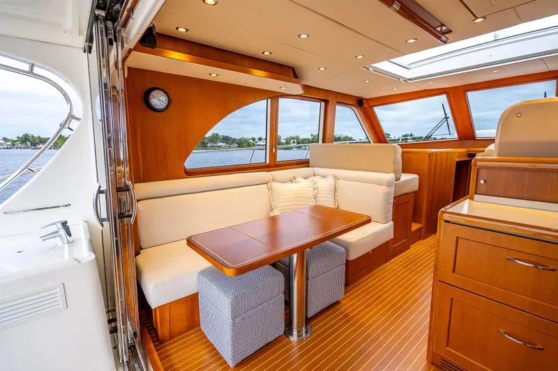 Slide: The Image of Luxurious interior of 2014 Grand Banks 50 Eastbay SX yacht with elegant wood finish. - 29