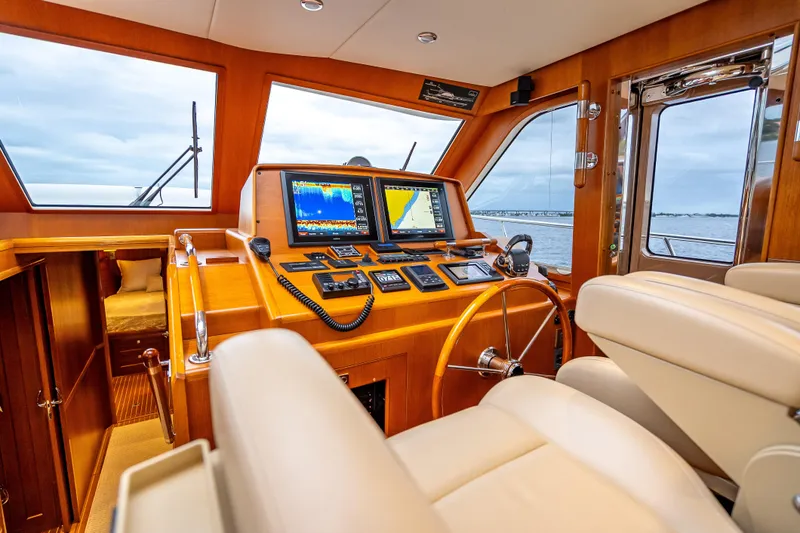 Slide: The Image of Luxurious 2014 Grand Banks 50 Eastbay SX yacht interior with navigation equipment. - 3