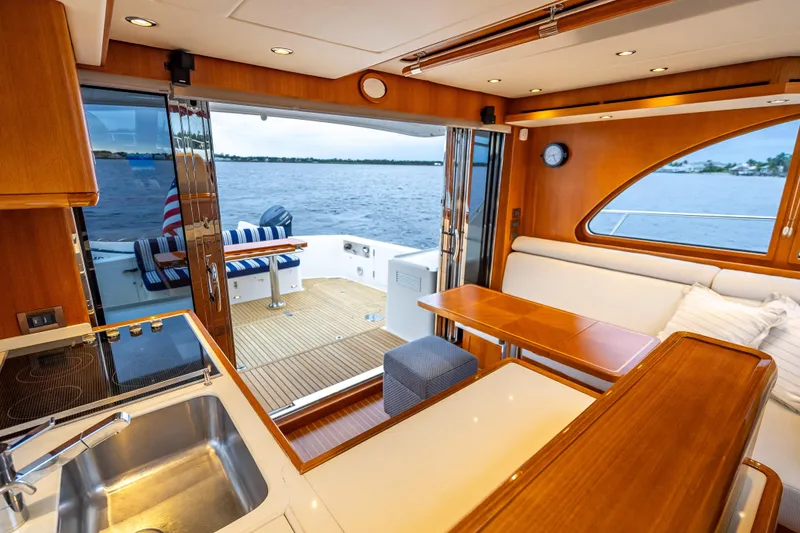 Slide: The Image of Luxurious interior of 2014 Grand Banks 50 Eastbay SX yacht with ocean view. - 33