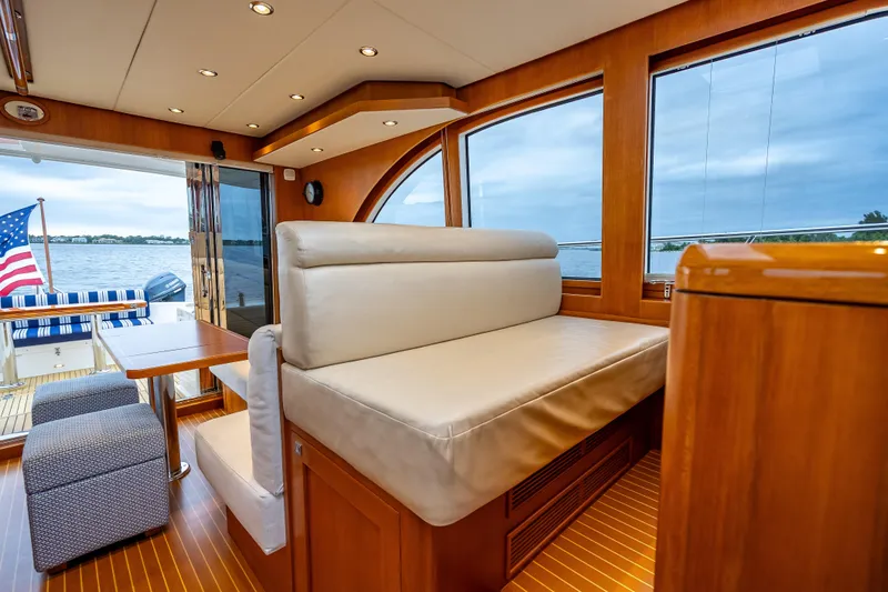 Slide: The Image of Luxurious interior of 2014 Grand Banks 50 Eastbay SX yacht with elegant seating and scenic views. - 40