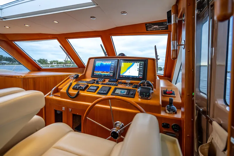 Slide: The Image of Luxurious helm of 2014 Grand Banks 50 Eastbay SX with advanced navigation systems. - 45
