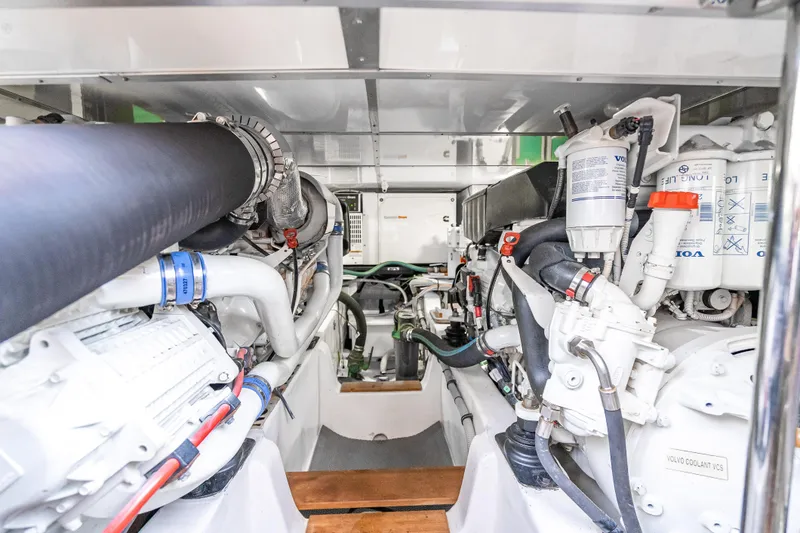 Slide: The Image of Engine room of 2014 Grand Banks 50 Eastbay SX with Volvo components and piping. - 67