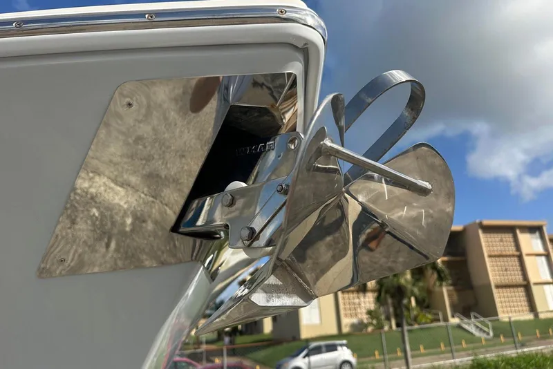 Slide: The Image of Close-up of a 2017 Cobia 296 Center Console boat anchor in sunlight. - 18