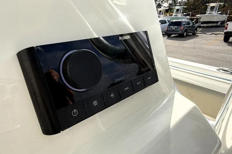 Slide: The Image of Fusion audio system on 2025 Key West 239 FS boat dashboard, featuring Bluetooth connectivity. - 29