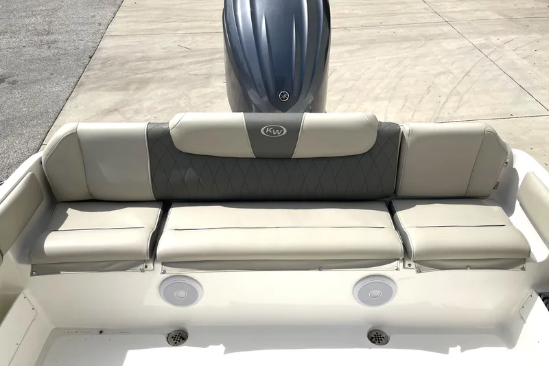 Slide: The Image of 2024 Key West 239 FS boat seating with gray upholstery and integrated speakers. - 35