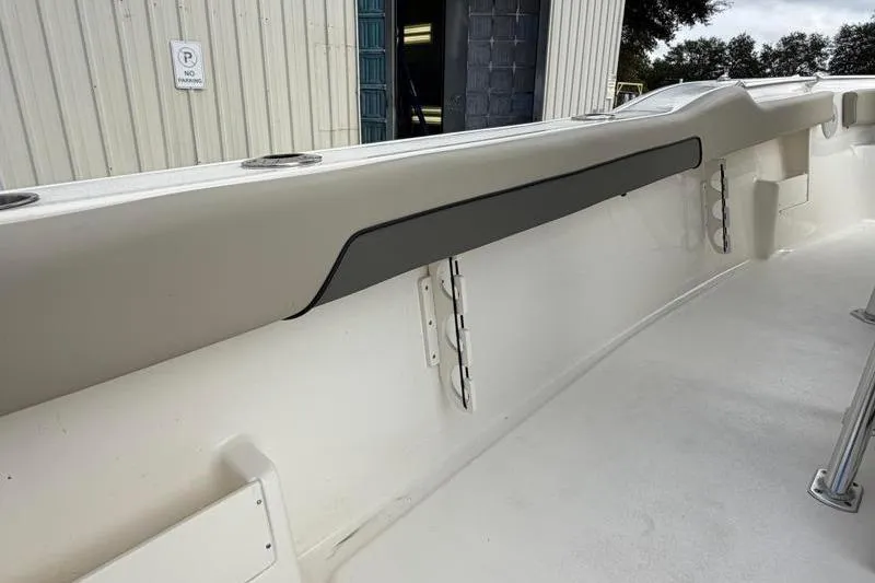 Slide: The Image of 2025 Key West 239 FS boat interior, featuring sleek white design and modern detailing. - 39