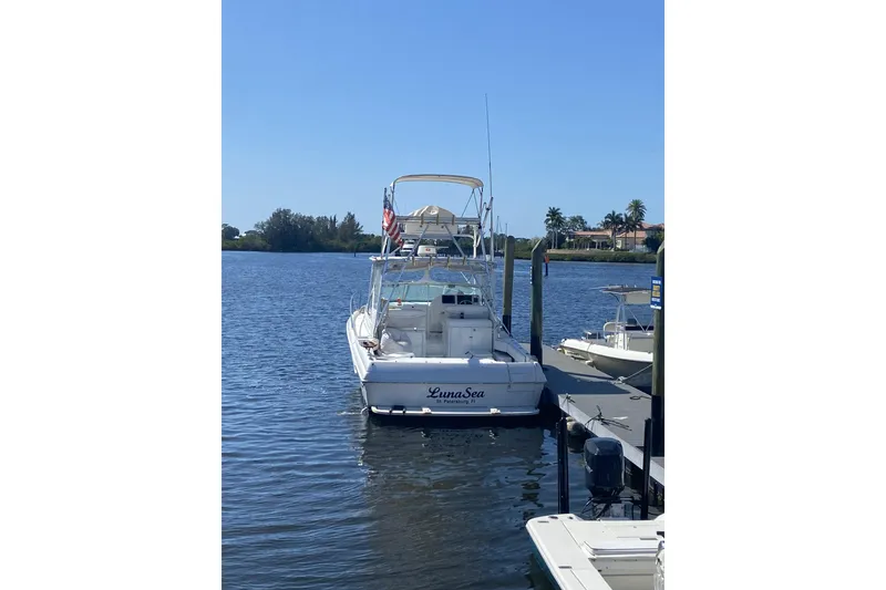 Slide: The Image of 2005 Stamas 370 Express docked on a sunny day, with clear blue skies. - 124