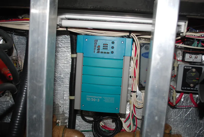 Slide: The Image of Electrical system inside 2005 Stamas 370 Express boat, featuring wiring and components. - 21