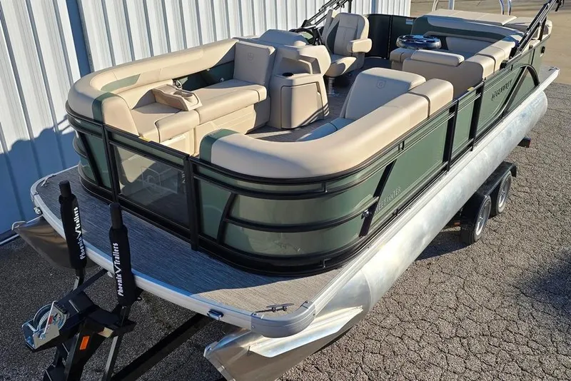 The Image of 2026 Sweetwater 2086 CRUISE pontoon boat with beige seating on trailer. - 0