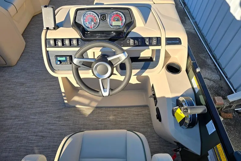 Slide: The Image of 2026 Sweetwater 2086 CRUISE dashboard with steering wheel and control panel. - 6