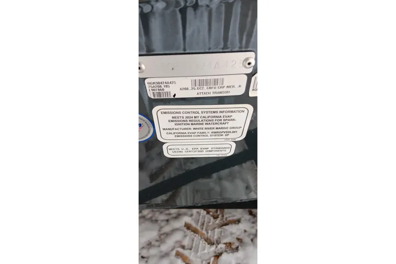 Slide: The Image of 2025 Ranger ALPHA 208 emissions control information label on vehicle transom. - 20