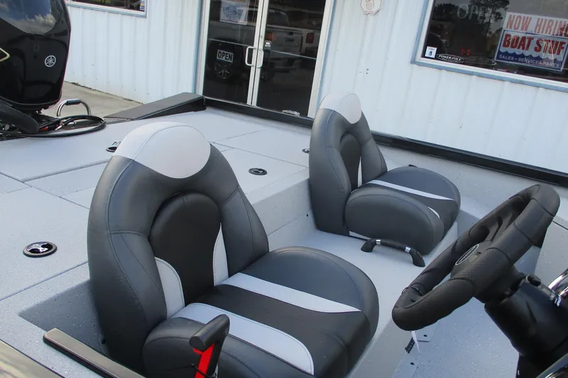 Slide: The Image of 2026 Vexus AVX189 boat interior with dual gray seats and steering wheel. - 4