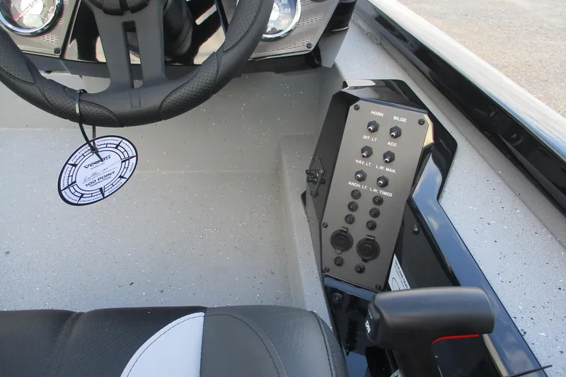 Slide: The Image of 2026 Vexus AVX189 boat dashboard with steering wheel and control panel. - 5