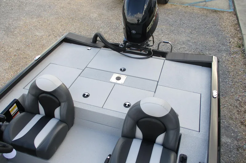 Slide: The Image of 2026 Vexus AVX189 boat interior with dual seats and motor, showcasing sleek design. - 13