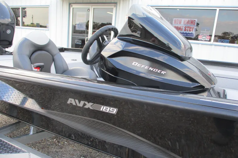 Slide: The Image of 2026 Vexus AVX189 boat with sleek black design and comfortable seating. - 7