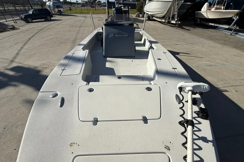 Slide: The Image of 2018 Blazer Bay 2420 GTS boat with Mercury engine, docked in a marina. - 11