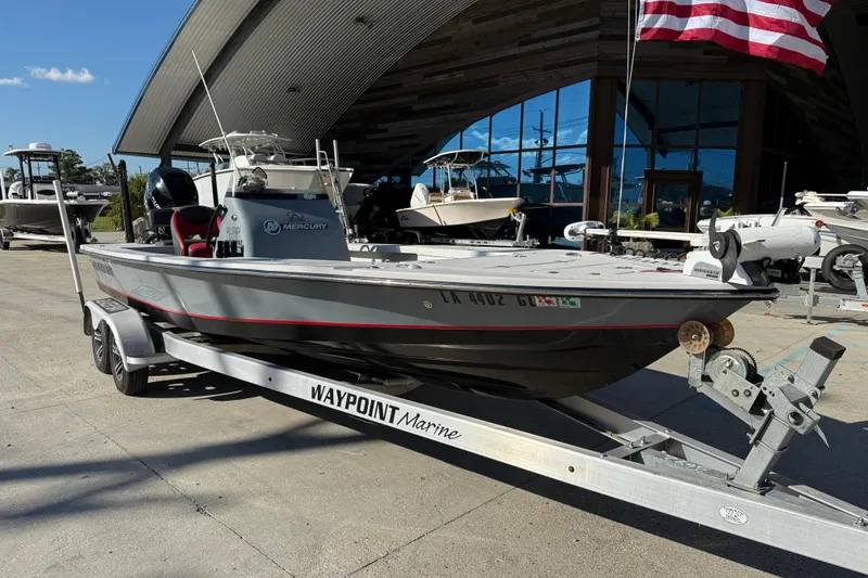 Slide: The Image of 2018 Blazer Bay 2420 GTS boat on trailer at Waypoint Marine dealership. - 2