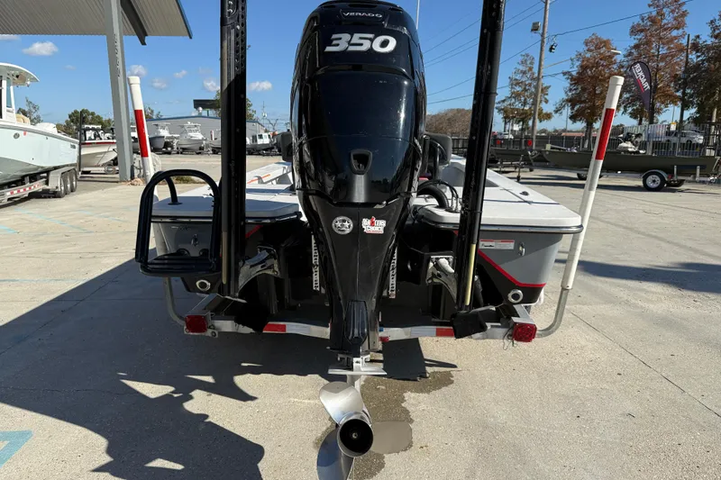 Slide: The Image of 2018 Blazer Bay 2420 GTS boat with powerful 350 engine, parked outdoors. - 6