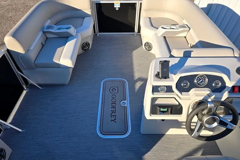 Slide: The Image of Interior of 2026 Godfrey Experience 2286 SFL pontoon boat with plush seating and modern dashboard. - 3