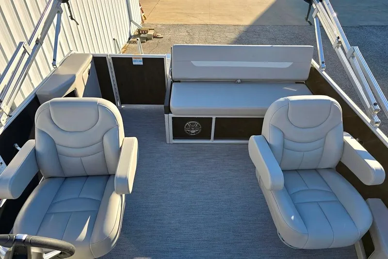 Slide: The Image of 2026 Godfrey Experience 2286 SFL boat interior with plush seating and modern design. - 4