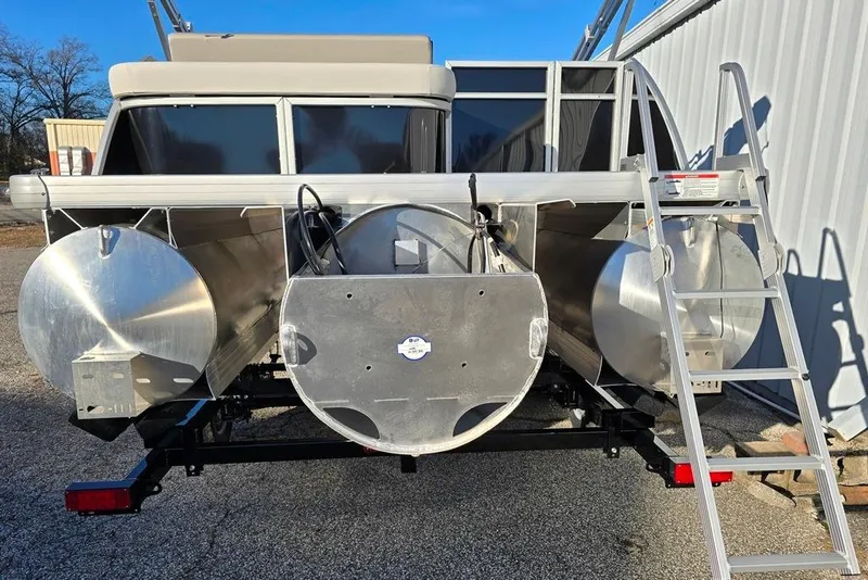 Slide: The Image of 2026 Godfrey Experience 2286 SFL pontoon boat rear view with ladder and aluminum pontoons. - 6