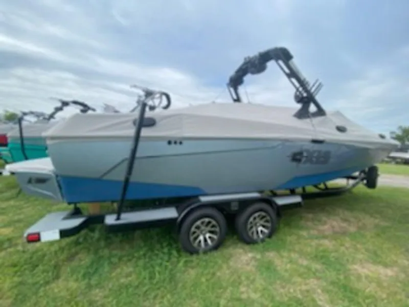 The Image of 2021 Axis A24 boat on trailer, side view. - 0