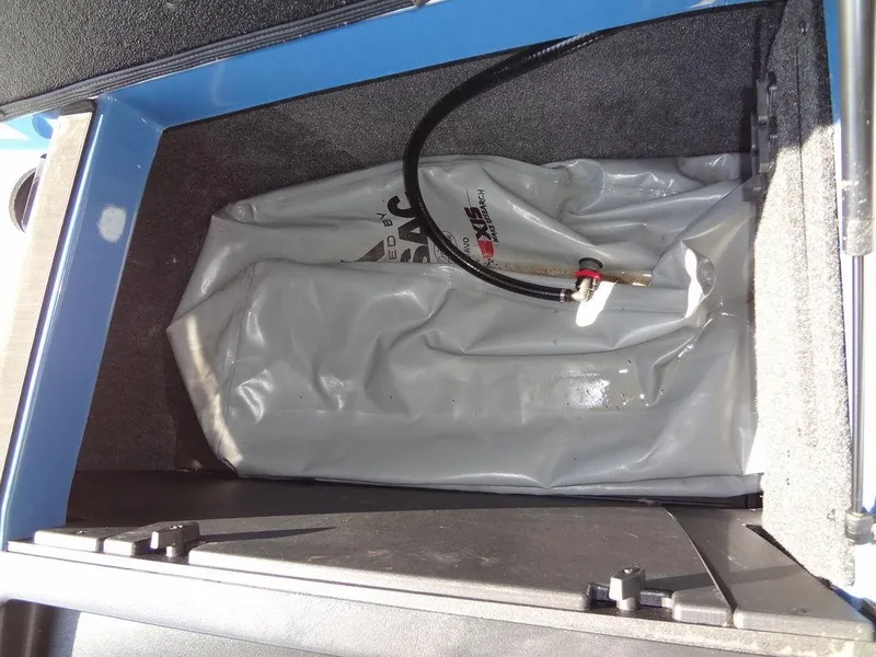 Slide: The Image of Axis A24 2021 ballast bag in storage compartment. - 36