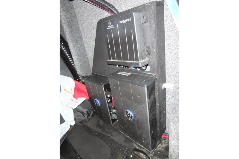 Slide: The Image of 2021 Axis A24 boat audio system with amplifiers installed in a compartment. - 41