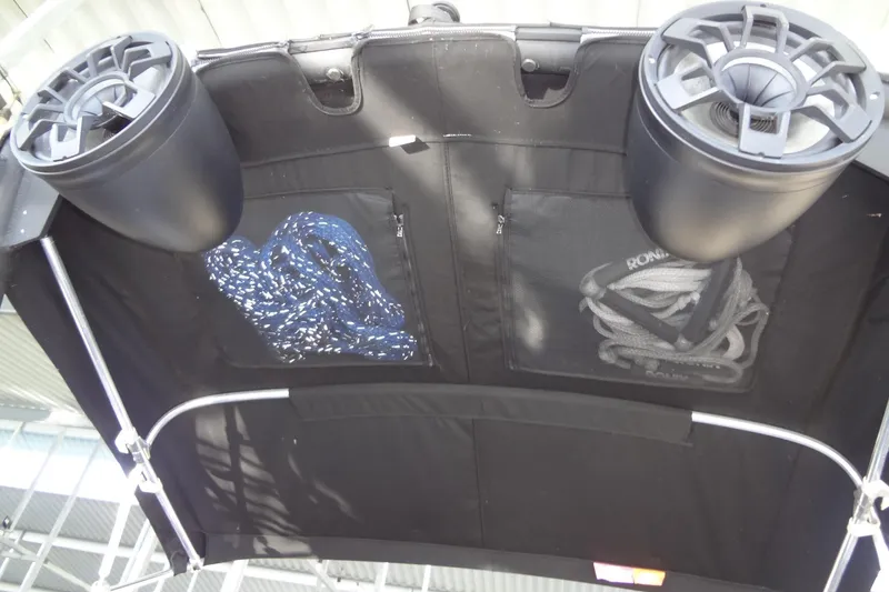 Slide: The Image of 2021 Axis A24 boat interior with speakers and storage pockets. - 47