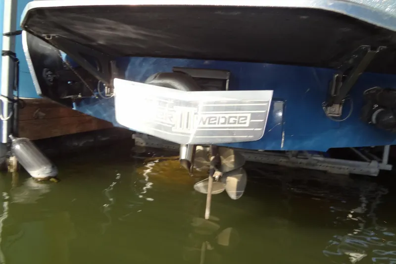 Slide: The Image of 2021 Axis A24 boat with propeller and wedge detail in water. - 57