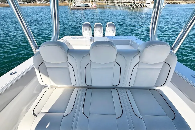 Slide: The Image of 2024 SeaHunter 39 Tournament boat interior with luxurious seating and ocean view. - 16
