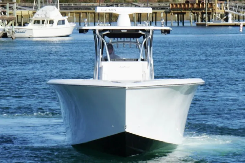 Slide: The Image of 2024 SeaHunter 39 Tournament boat cruising on a calm blue sea. - 4