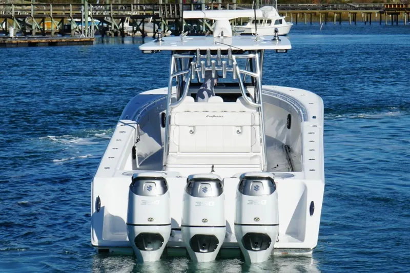 Slide: The Image of 2024 SeaHunter 39 Tournament boat with triple 350 engines on the water. - 5