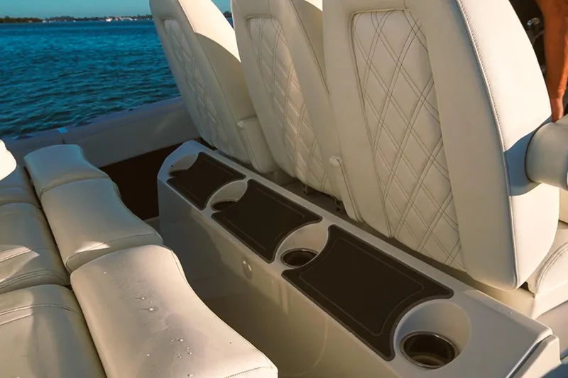 Slide: The Image of Luxurious seating on 2022 World Cat 400 CC-X boat with ocean backdrop. - 18
