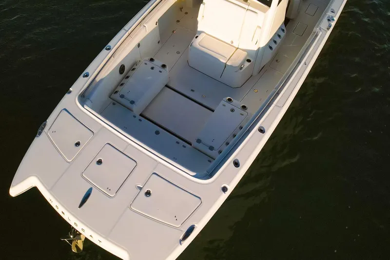 Slide: The Image of 2022 World Cat 400 CC-X boat, aerial view, spacious deck, sleek design. - 20