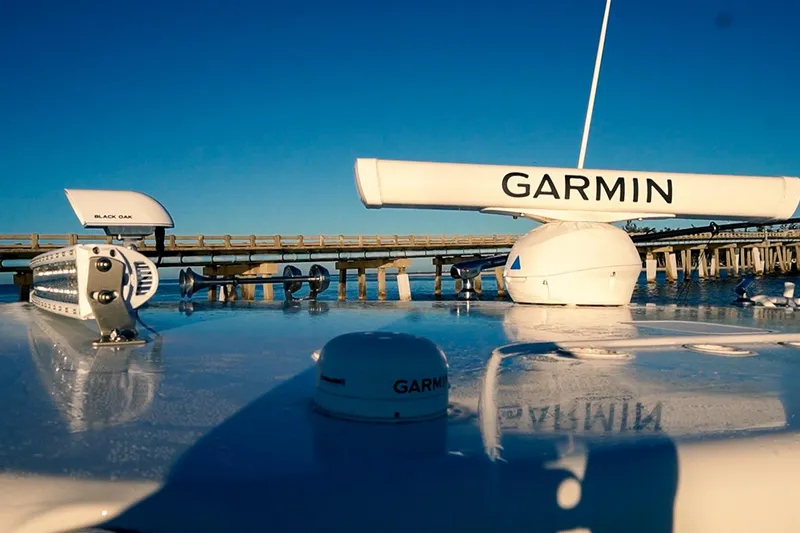 Slide: The Image of 2022 World Cat 400 CC-X boat with Garmin radar and Black Oak light bar. - 25