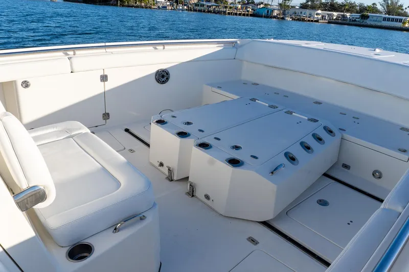 Slide: The Image of 2022 World Cat 400 CC-X boat interior with spacious seating and storage. - 31