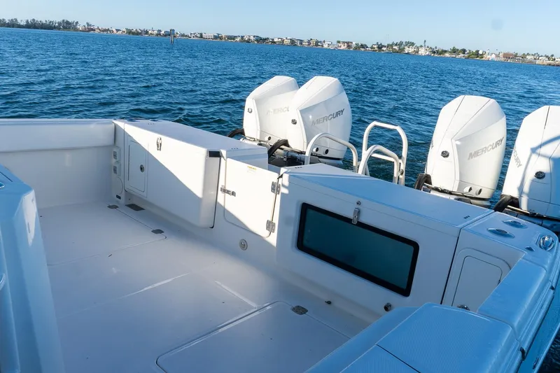 Slide: The Image of 2022 World Cat 400 CC-X boat with Mercury engines on open water. - 32