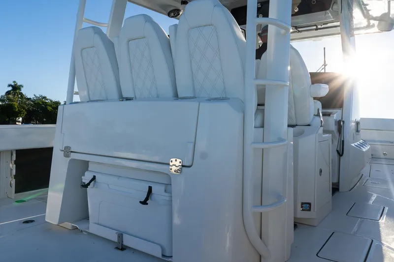 Slide: The Image of 2022 World Cat 400 CC-X boat interior with seating and storage compartments. - 42