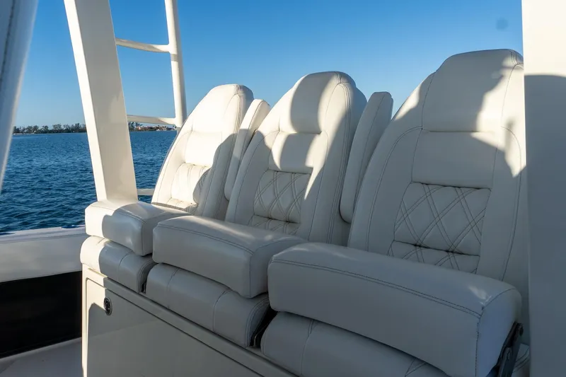 Slide: The Image of Luxurious seating on 2022 World Cat 400 CC-X boat with ocean view. - 51