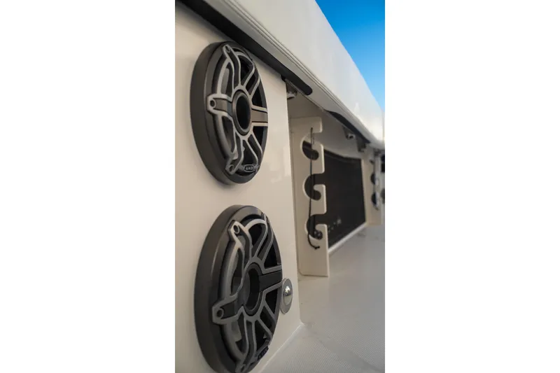 Slide: The Image of 2022 World Cat 400 CC-X boat speakers and storage compartment detail. - 58